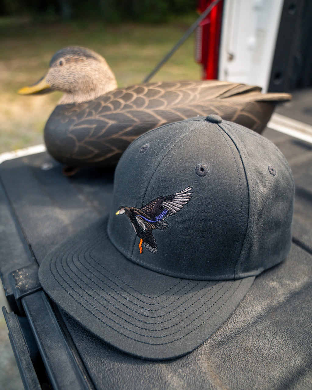 Waxed Rambler Trucker — Black Duck on Coal
