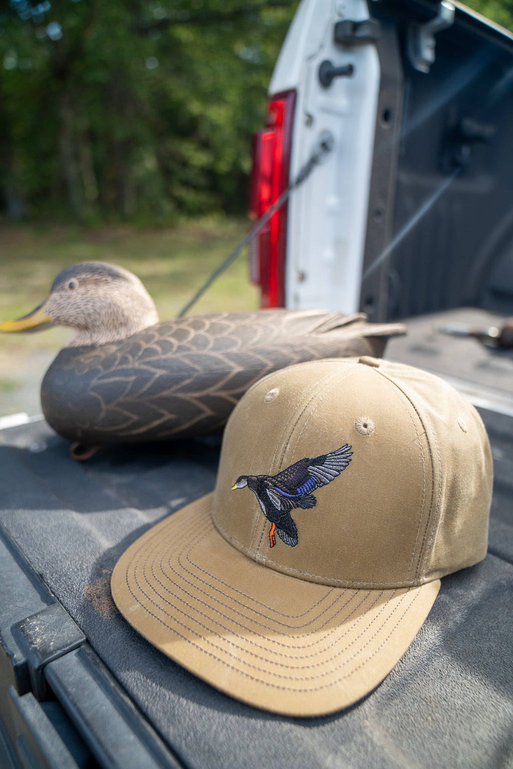 Waxed Rambler Trucker — Black Duck on Wheat